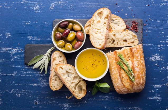 Nafplion Food Tasting Tour: bread olives and olive oil on a table